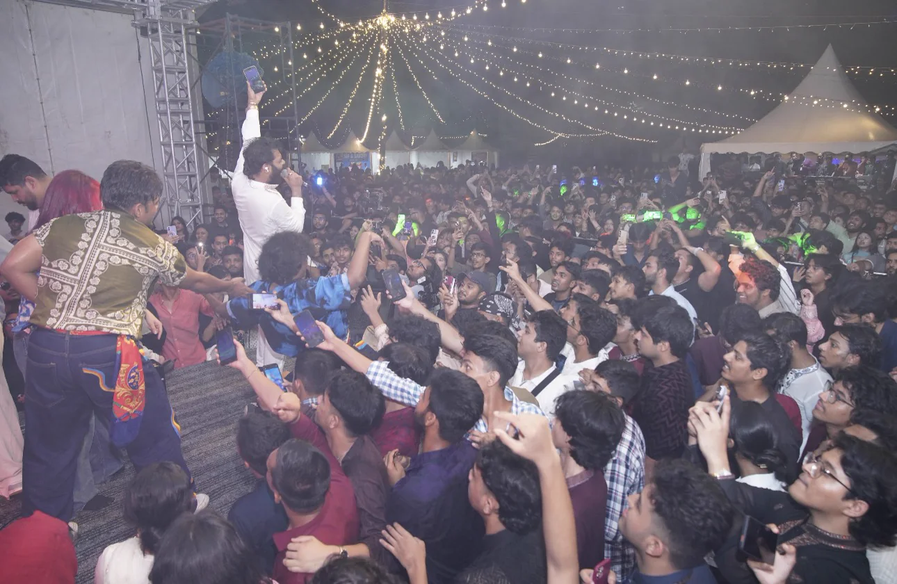 Performers connecting with the Eid-E-Bahar audience at the front of the stage